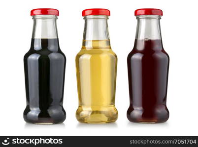 Bottles of juice isolated over white background