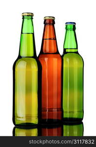 Bottles of lager and beer from brown and green glass, isolated on a white background.