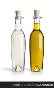 Bottles with oil and vinegar on white background