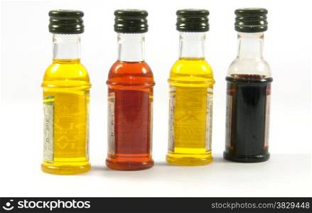 bottles with olive oil in different taste