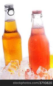 bottles with tasty drink in ice