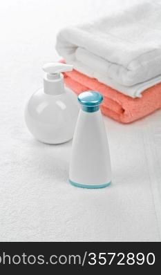 bottles with two towels