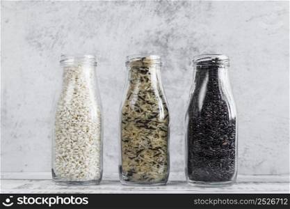 bottles with various sorts rice