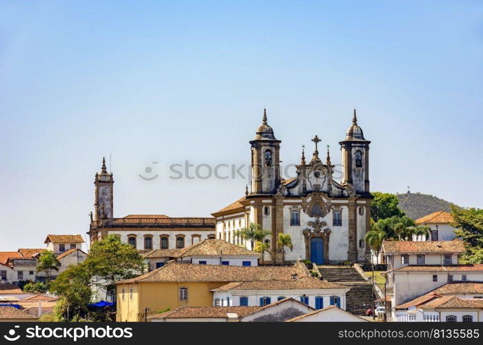 Bottom view of the historic center of Ouro Preto city with its houses, church, monuments and mountains. Bottom view of the historic center of Ouro Preto city with houses, churches and monuments