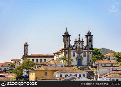 Bottom view of the historic center of Ouro Preto city with its houses, church, monuments and mountains. Bottom view of the historic center of Ouro Preto city with houses, churches and monuments