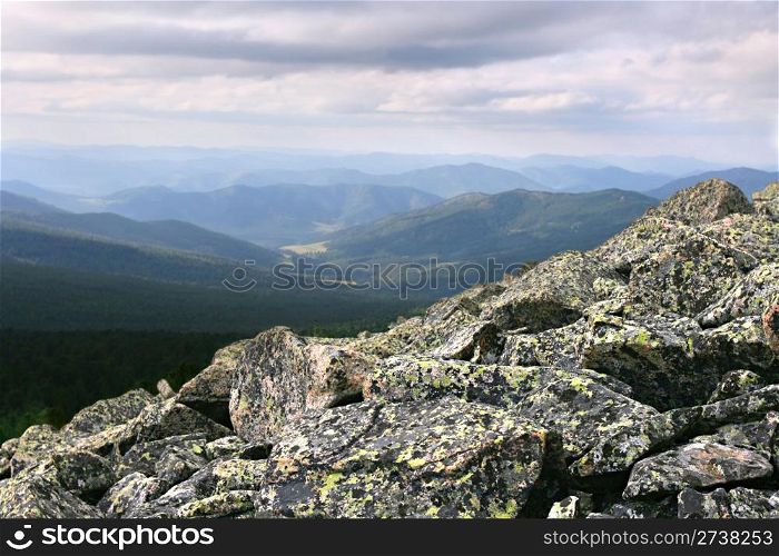 boulders covered in moss in Altai mountains