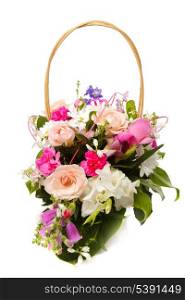 Bouquet from different pink seasonal flowers of september in basket isolated on white