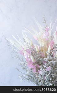 Bouquet of colorful dried flowers whites and pink and white spikes