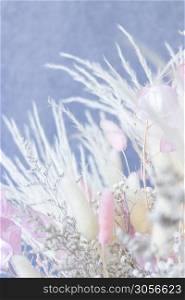 Bouquet of colorful dried flowers whites and pink and white spikes