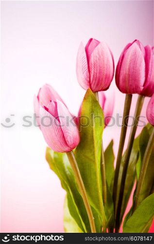 Bouquet of colorful tulips on the table