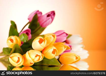 Bouquet of colorful tulips on the table