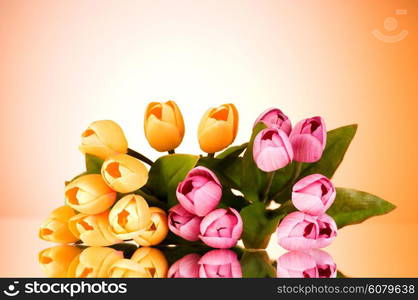 Bouquet of colorful tulips on the table