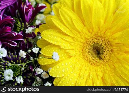 bouquet of different flowers with yellow gerbera