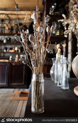 bouquet of dried poppies in the interior