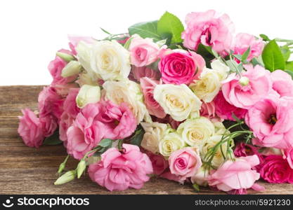 bouquet of fresh roses. bouquet of pink and white fresh roses and eustoma flowers isolated on white background