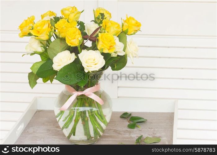 bouquet of fresh roses. bouquet of yellow and white fresh roses in vase