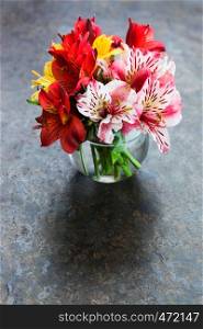 bouquet of lilies in a glass vase