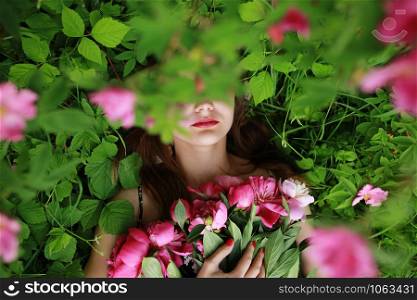 Bouquet of Peony. Stylish fashion photo of beautiful young woman lies among peonies. Holidays and Events. Valentine?s Day. Spring blossom. Summer season. Bouquet of Peony. beautiful young woman lies among peonies. Holidays and Events. Valentine?s Day. Spring blossom.