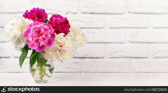 Bouquet of pink and white peony flowers in vase on white brick wall background. Mockup, template for holiday, birthday, mother’s day. Banner, header with copy space