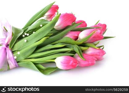 bouquet of pink tulips tied with ribbon