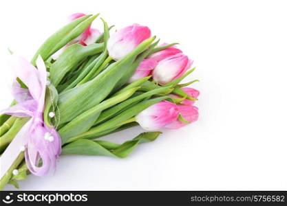bouquet of pink tulips tied with ribbon