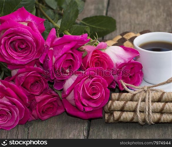 bouquet of red roses and coffee close-up