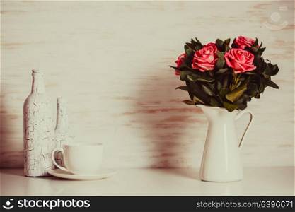 Bouquet of roses. Luxury bouquet of roses lying over wooden wall. Copy space
