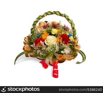 Bouquet of various flowers in a basket isolated on white
