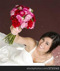 Bouquet Raised Happy Bride Wearing White Wedding Gown