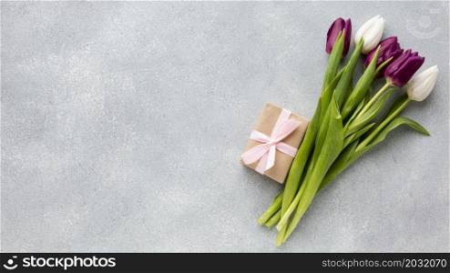 bouquet tulips with wrapped gift copy space