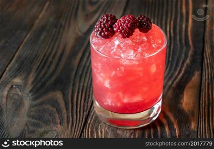 Bourbon Renewal cocktail garnished with blackberries