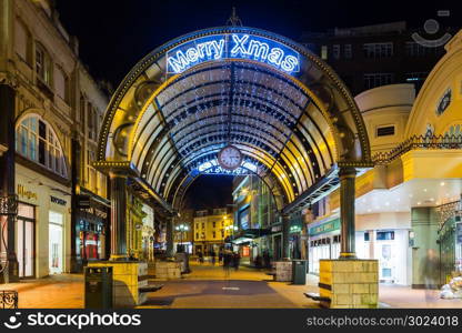 Bournemouth, Dorset, England: 26 December 2014 - A busy scene in Old Christchurch Road, one of Bournemouth&rsquo;s main shopping streets, with crowds of people walking.