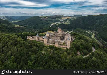 Bourscheid, Luxembourg - 3 June, 2022: drone view of the historic 11th-century Bourscheid Castle in northern Luxembourg