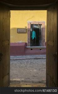 Boutique viewed through doorway, San Miguel de Allende, Guanajuato, Mexico