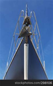 bow and mast on sailing boat, front view