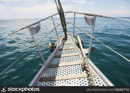 Bow of yacht sailing in sea