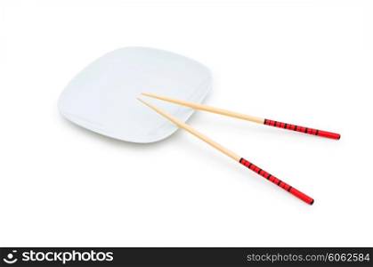 Bowl and chopsticks on the bamboo mat