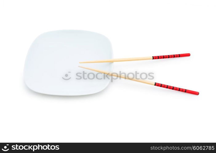 Bowl and chopsticks on the bamboo mat