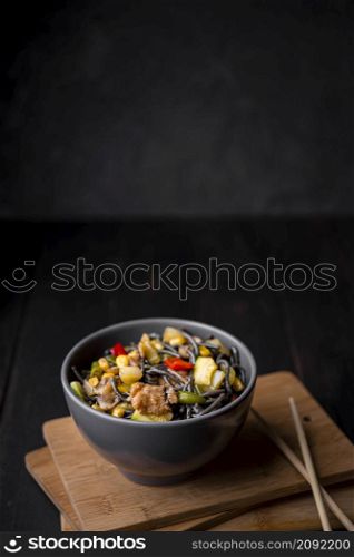 bowl noodles with vegetables chopsticks