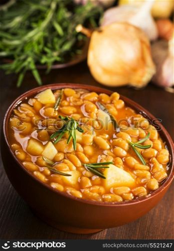 bowl of bean soup with rosemary