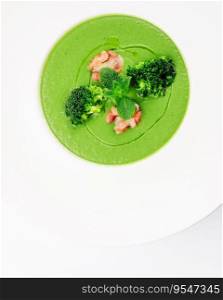Bowl of broccoli cream soup with walnut