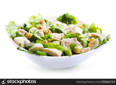 bowl of chicken salad on white background