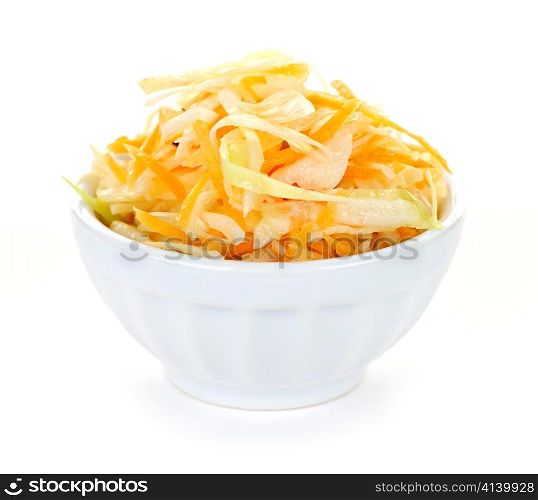 Bowl of coleslaw with shredded cabbage isolated on white background