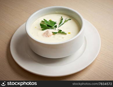 bowl of creamy Norwegian soup with salmon
