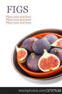 Bowl of figs isolated on white with place for text