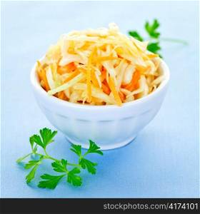 Bowl of fresh coleslaw with shredded cabbage