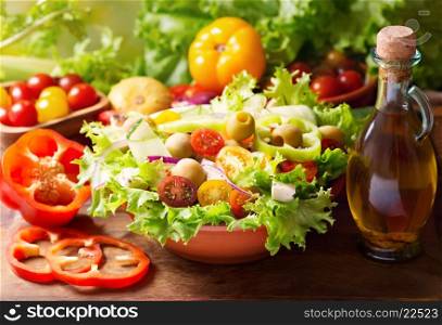 bowl of fresh vegetable salad on wooden table