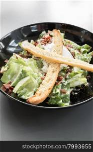 bowl of green caesar salad