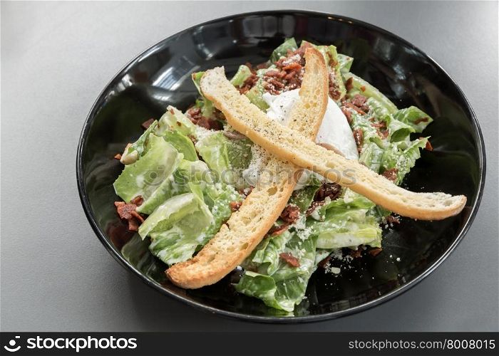 bowl of green caesar salad