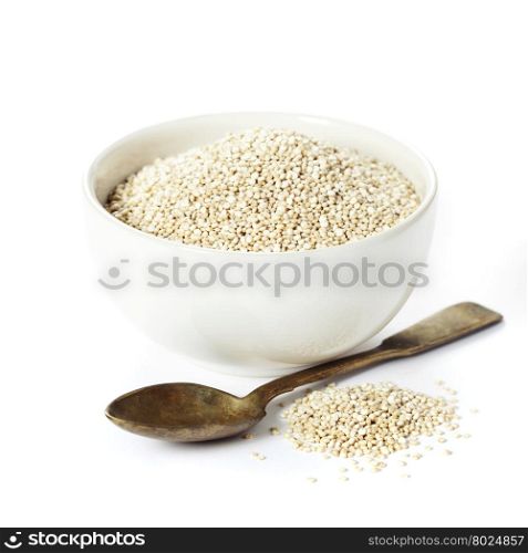 Bowl of healthy white quinoa seeds on white